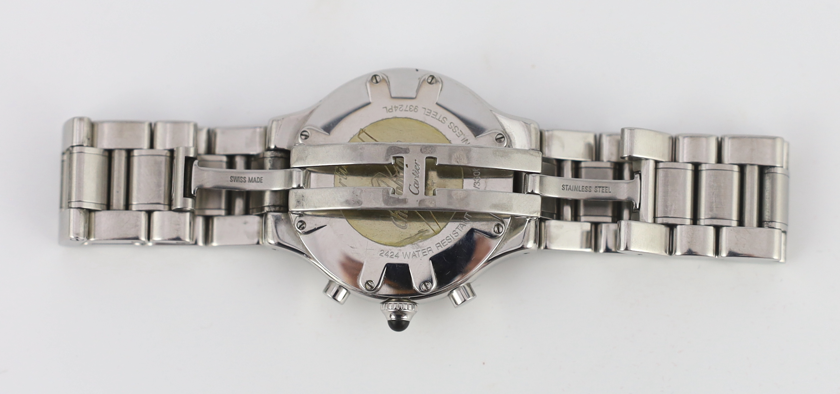 A gentleman's modern stainless steel Cartier 21 Chronograph quartz wrist watch, on a stainless steel Cartier bracelet